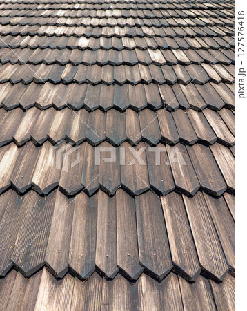 Old traditional wooden shingle roof 127576418