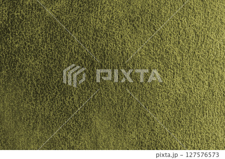 Close up, macro structure of khaki suede fabric with abstract embossed shabby, messy texture. Close up, macro structure of khaki suede fabric with abstract embossed shabby, messy texture. 127576573