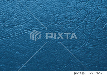 Close up, macro texture of blue glossy natural genuine leather, leatherette structure Close up, macro texture of blue glossy natural genuine leather, leatherette structure 127576576
