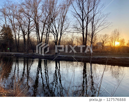 sunset on the river with tree silhouette, nature photography sunset on the river with tree silhouette, nature photography 127576888