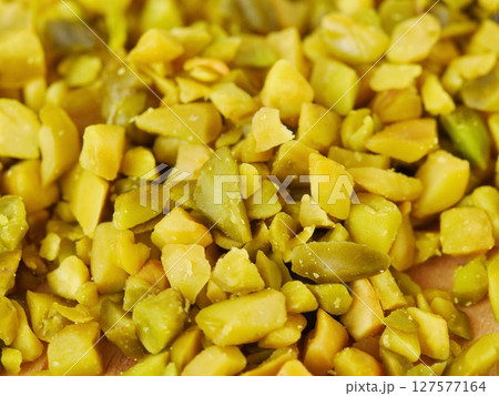 A pile of green food with a lot of pieces 127577164