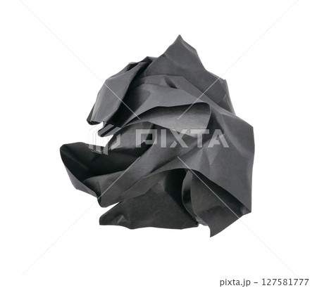 Crumpled black paper ball isolated on white background 127581777