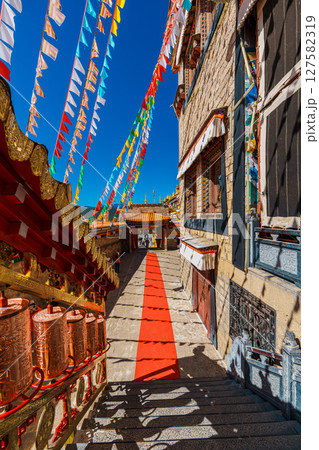 Colorful Tibetan Prayer Flags and Architecture of Songzanlin Monastery Colorful Tibetan Prayer Flags and Architecture of Songzanlin Monastery 127582319
