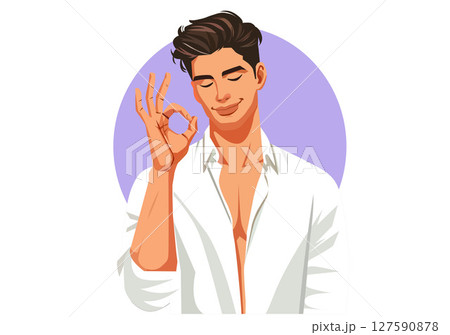 A young man makes an OK sign with a smile and a satisfied expression. 127590878