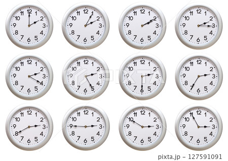 A set of 12 Round Silver Wall Clocks Showing 02:00 to 02:55 or 14:00 to 14:55 Isolated-White. Useful for concepts like noon, midnight, deadline, countdown, or time management. A set of 12 Round Silver Wall Clocks Showing 02:00 to 02:55 or 14:00 to 14:55 Isolated-White. Useful for concepts like noon, midnight, deadline, countdown, or time management. 127591091