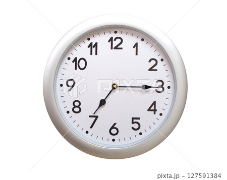 Round Silver Wall Clock Showing 07:15 or 19:15 Isolated-White. Useful for concepts like noon, midnight, deadline, countdown, or time management. 127591384