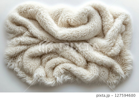 Alpaca wool throw blanket on a white background. For minimalist luxury living room. 127594680
