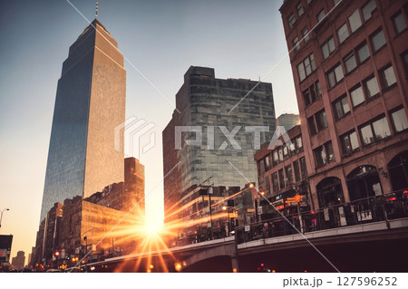 City street with sunset view, skyscrapers and street lights. Generative AI. City street with sunset view, skyscrapers and street lights. Generative AI. 127596252