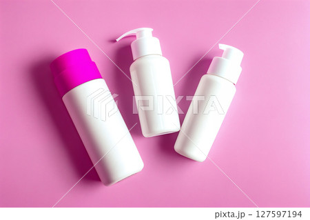 A perfume or a bottle for cosmetics on a pink background. Generative AI. 127597194