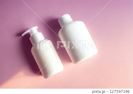 A perfume or a bottle for cosmetics on a pink background. Generative AI. A perfume or a bottle for cosmetics on a pink background. Generative AI. 127597196