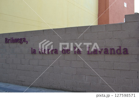Lavender festival celebration in Brihuega, Spain with colorful street decorations. Brihuega, the land of lavender - in Spanish Lavender festival celebration in Brihuega, Spain with colorful street decorations. Brihuega, the land of lavender - in Spanish 127598571