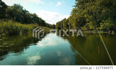 Scenic River Landscape with Fishing Rod 127598975