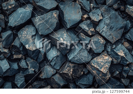 A pile of rocks, The rocks are of different sizes and shapes, strength and durability 127599744