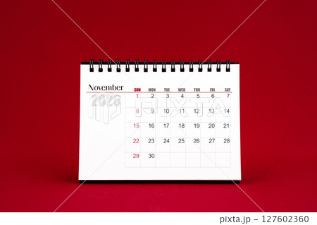 November 2026 Blank desk calendar on red color background. November 2026 Blank desk calendar on red color background. 127602360