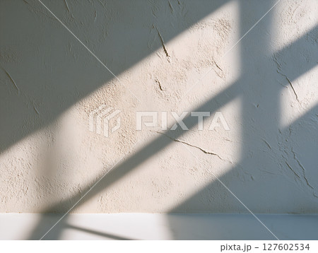 Wall with a shadow on it Wall with a shadow on it 127602534