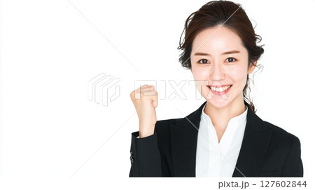 ガッツポーズをする女性 127602844