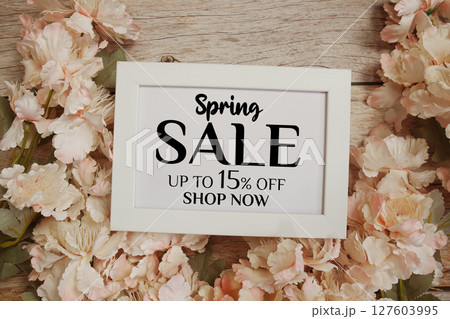 Spring Sale 15% off Promotion Offer Discount Retail Shopping Concept 127603995