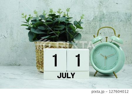 Wooden Calendar Showing the Date of July 11th. Day 11 of July month 127604012