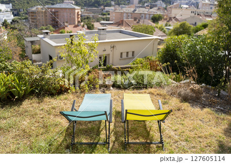 A Relaxing Outdoor Space Featuring Comfortable Sun Loungers and a Beautiful Scenic View A Relaxing Outdoor Space Featuring Comfortable Sun Loungers and a Beautiful Scenic View 127605114