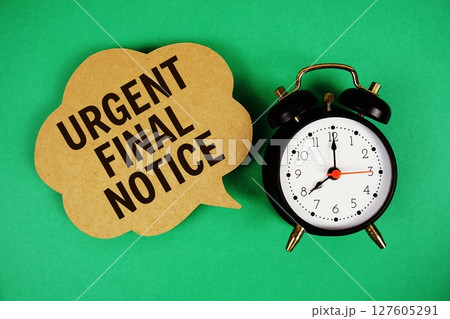 Urgent Final Notice text on speech bubble with alarm clock on green background 127605291