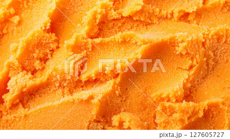オレンジのシャーベットのクローズアップテクスチャ背景	 127605727