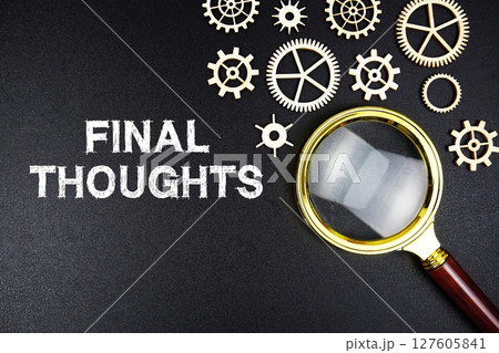 Final Thoughts text message with magnifying glass on black background Final Thoughts text message with magnifying glass on black background 127605841