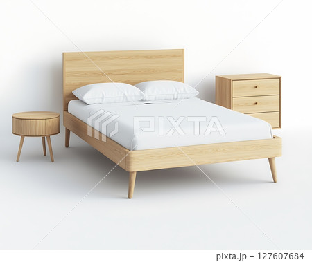 A wooden bed with a white sheet and pillows 127607684