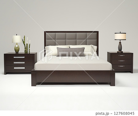 A bed with a white pillow and a lamp on the nightstand 127608045