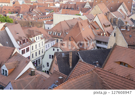 Explore the stunning rooftops of a historic European town, rich in culture and heritage Explore the stunning rooftops of a historic European town, rich in culture and heritage 127608947