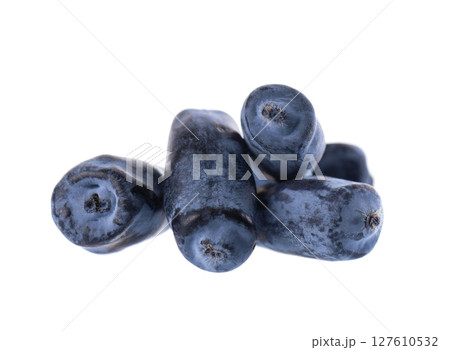 Honeysuckle berry isolated on white background. Fresh honeysuckle blue berry fruits. Clipping path. 127610532