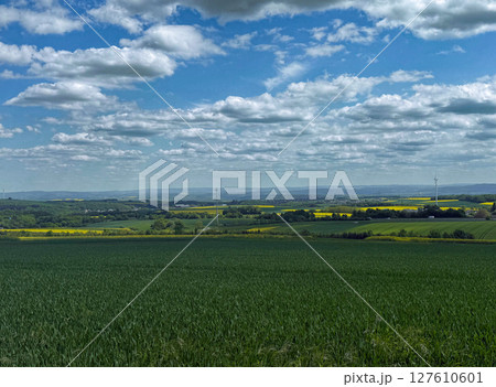 Beautiful view from the hills to a small village. Warm and sunny day 127610601