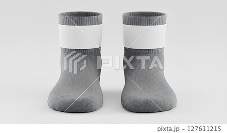 Blank, empty athletic socks mockup, rolled front view with label band, 3d rendering, Isolated sports accessory, ecommerce display template. 127611215