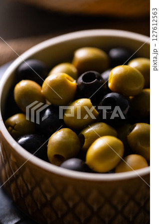 Green and Black Olives 127612563
