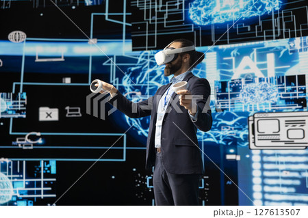 Business IT expert employs vr glasses and artificial intelligence brain, working on data visualization cybernetics within a futuristic interface for machine learning. High tech gadget for innovation. 127613507