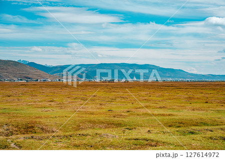 Shangri-la Landscape with Stupa and Snow-Capped Mountains Shangri-la Landscape with Stupa and Snow-Capped Mountains 127614972