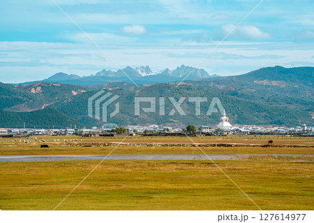 Shangri-la Landscape with Stupa and Snow-Capped Mountains Shangri-la Landscape with Stupa and Snow-Capped Mountains 127614977