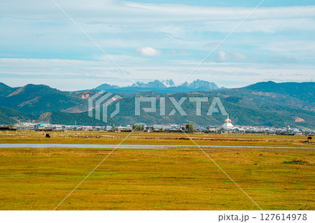 Shangri-la Landscape with Stupa and Snow-Capped Mountains Shangri-la Landscape with Stupa and Snow-Capped Mountains 127614978