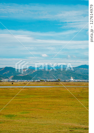 Shangri-la Landscape with Stupa and Snow-Capped Mountains Shangri-la Landscape with Stupa and Snow-Capped Mountains 127614979