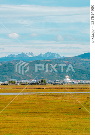 Shangri-la Landscape with Stupa and Snow-Capped Mountains Shangri-la Landscape with Stupa and Snow-Capped Mountains 127614980