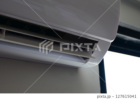white air conditioner on wall, electricity object in home 127615041