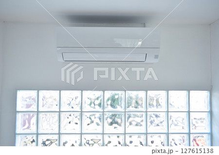 white air conditioner on wall, electricity object in home 127615138