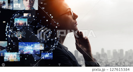 考える女性と映像テクノロジーのコラージュ バナー・広告向け横長ビジュアル 考える女性と映像テクノロジーのコラージュ バナー・広告向け横長ビジュアル 127615384