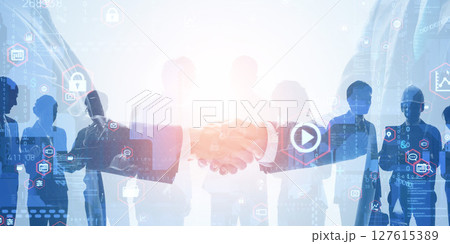 握手するビジネスパーソンのグループとデジタルテクノロジーのコンセプト バナー・広告向け横長ビジュアル 握手するビジネスパーソンのグループとデジタルテクノロジーのコンセプト バナー・広告向け横長ビジュアル 127615389