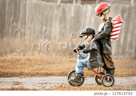 Children play in the rider and the rocketman 127618792