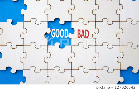Good or Bad symbol. Concept word Good or Bad on wooden puzzle. Beautiful blue background. Business and Good or Bad concept. Copy space Good or Bad symbol. Concept word Good or Bad on wooden puzzle. Beautiful blue background. Business and Good or Bad concept. Copy space 127620342