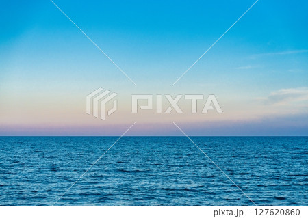 Serene Ocean Horizon at Dusk A Calming Seascape of Tranquility and Beauty Serene Ocean Horizon at Dusk A Calming Seascape of Tranquility and Beauty 127620860