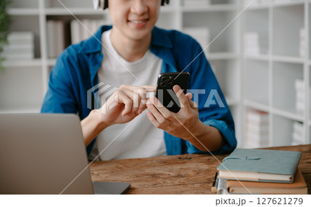 businessman hand working with new modern computer using on smartphone and tablet as concept businessman hand working with new modern computer using on smartphone and tablet as concept 127621279