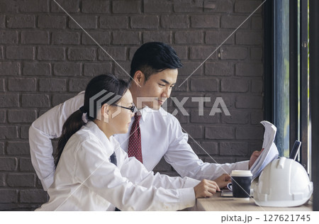construction business plan deconstruction team consulting partnership. Construction engineer teamwork Safety Suit Trust Team implement honest planning in Construction Site. Trustworthy engineer team. 127621745