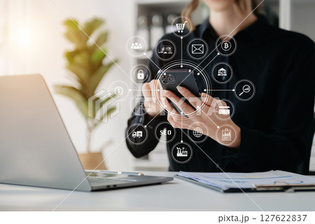 Digital marketing media in virtual screen.business working digital tablet, smartphone with computer laptop at office 127622837