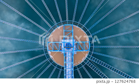 Aerial view circular clarifier tank at watewater treatment plant, Industrial infrastucture, Environment technology sustainable water management system, Semimentation tank circular clarifier. Aerial view circular clarifier tank at watewater treatment plant, Industrial infrastucture, Environment technology sustainable water management system, Semimentation tank circular clarifier. 127624768